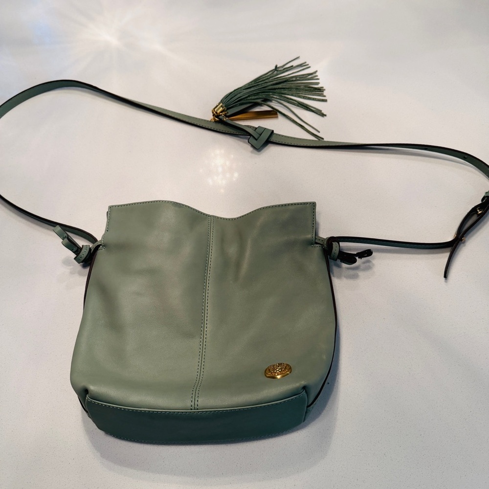 Vince Camuto sage green cinch drawstring cross body bag/purse with tassel